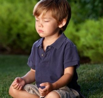 boy-meditating-in-grass-e1351194334983
