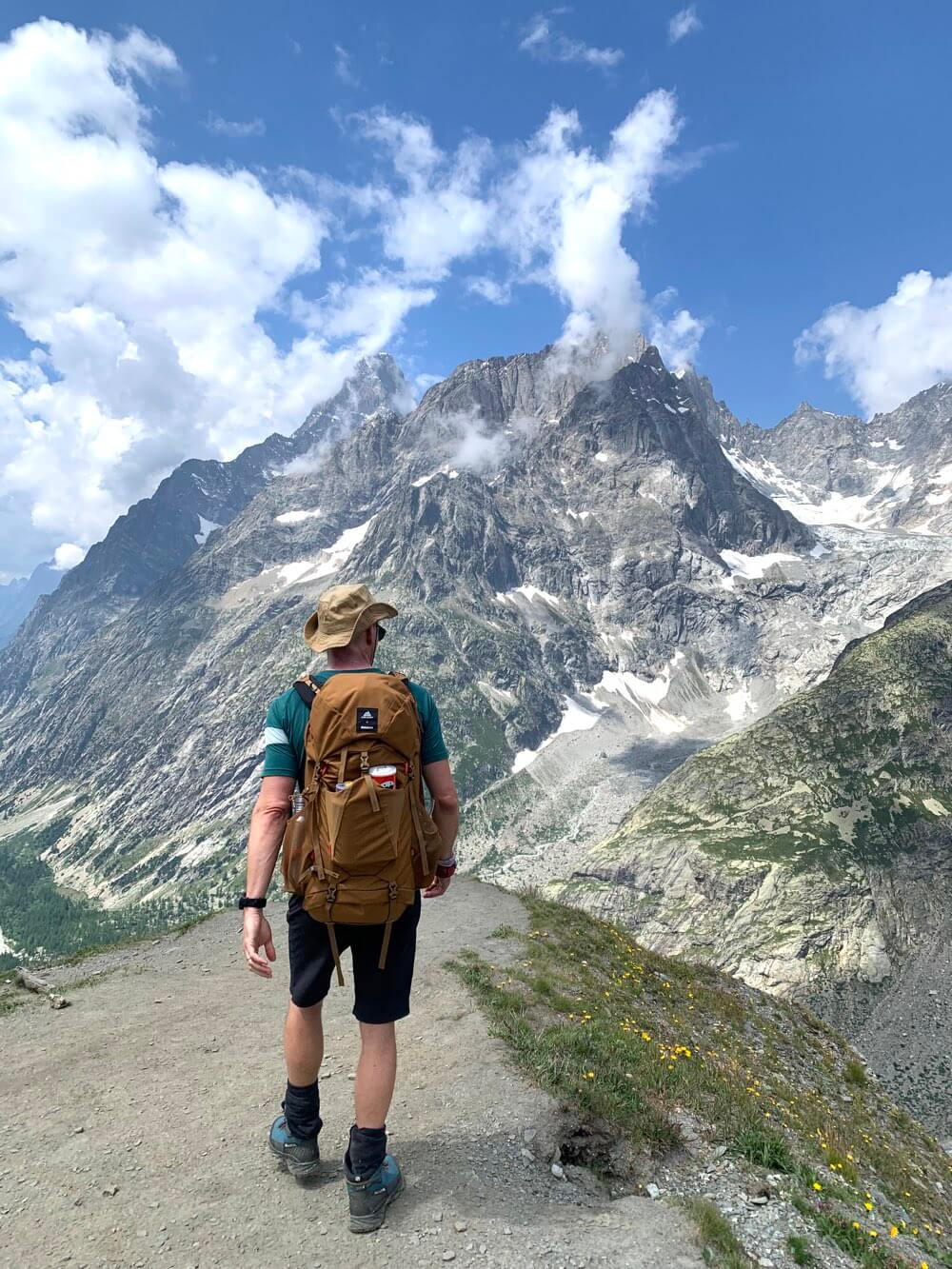 Mark with his Finisterre + Gregory Men's Stout 45L Backpack on the TMB